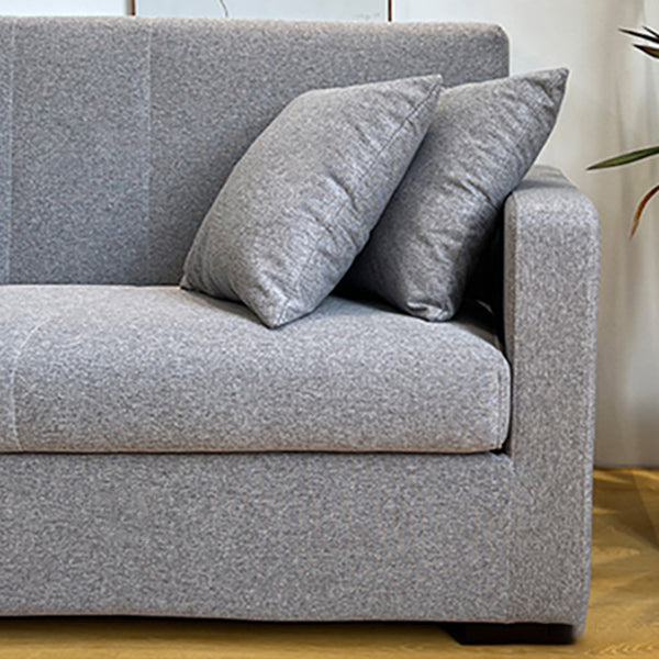 Salon contemporain biscuit arrière carré bras argent canapé stationnaire