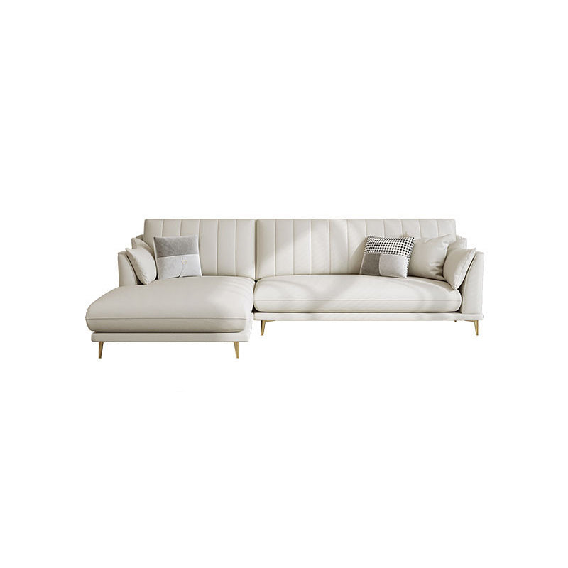 Sloped Arm Sofa with Chaise in White Sewn Pillow Back Faux Leather Sofa - 68.9" D