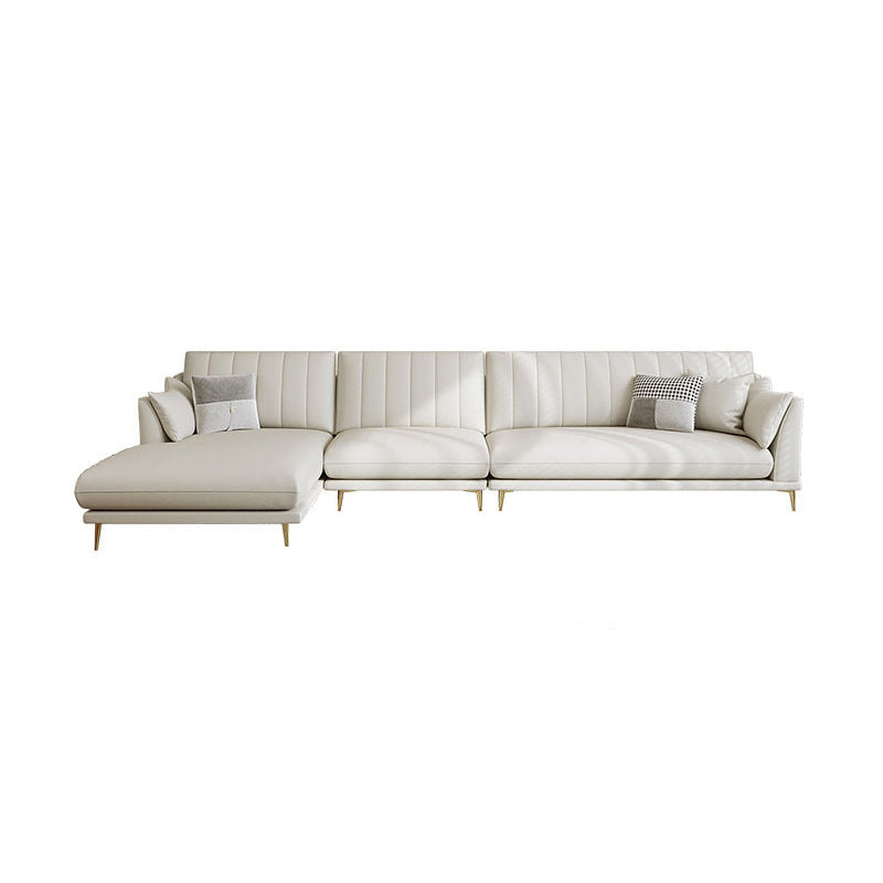 Sloped Arm Sofa with Chaise in White Sewn Pillow Back Faux Leather Sofa - 68.9" D