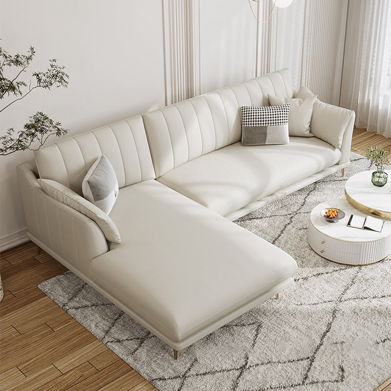Sloped Arm Sofa with Chaise in White Sewn Pillow Back Faux Leather Sofa - 68.9" D