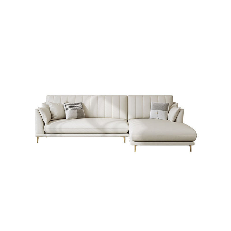 Sloped Arm Sofa with Chaise in White Sewn Pillow Back Faux Leather Sofa - 68.9" D