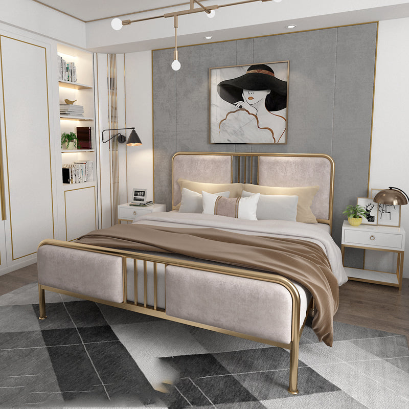 Letto in metallo imbottito con testiera a basso profilo con gambe metalliche