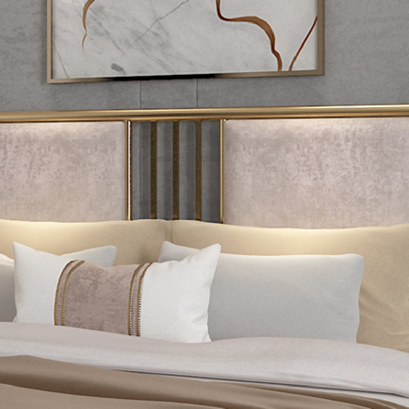 Letto in metallo imbottito con testiera a basso profilo con gambe metalliche