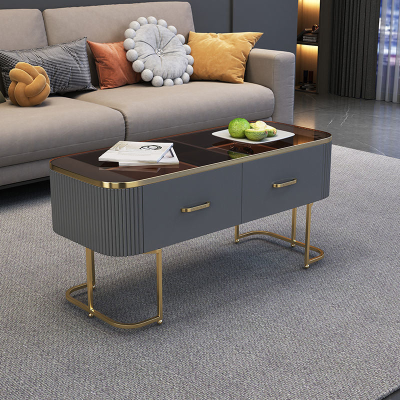 Eigentijdse salontafel met opberglade en gouden framebasis