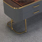 Eigentijdse salontafel met opberglade en gouden framebasis