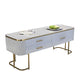Eigentijdse salontafel met opberglade en gouden framebasis