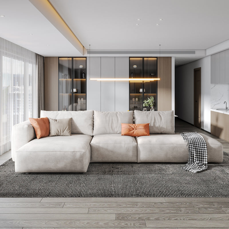 Sofá de brazo cuadrado de cuero falso con chaise moderno sofá de espalda suelta en gris