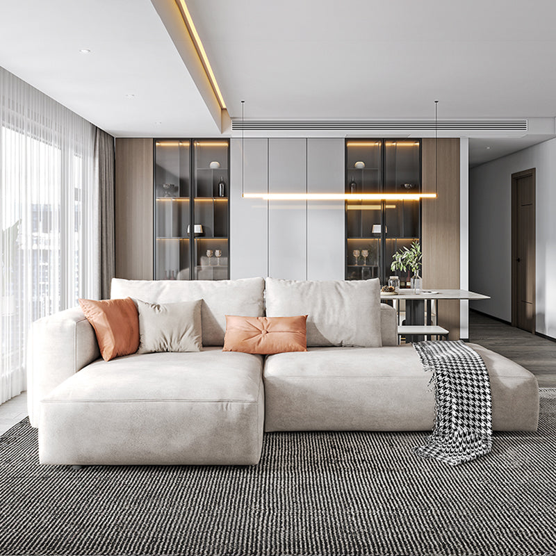 Sofá de brazo cuadrado de cuero falso con chaise moderno sofá de espalda suelta en gris