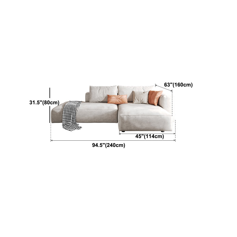 Sofá de brazo cuadrado de cuero falso con chaise moderno sofá de espalda suelta en gris