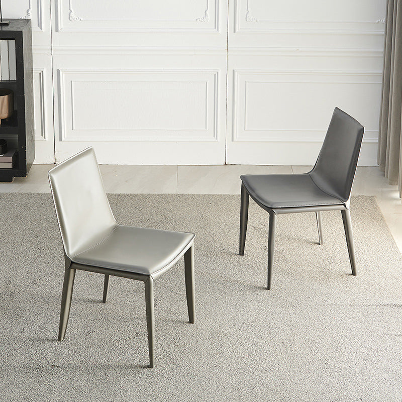 Eigentijdse armloze eetkamerstoelen faux lederen eetkamerstoel
