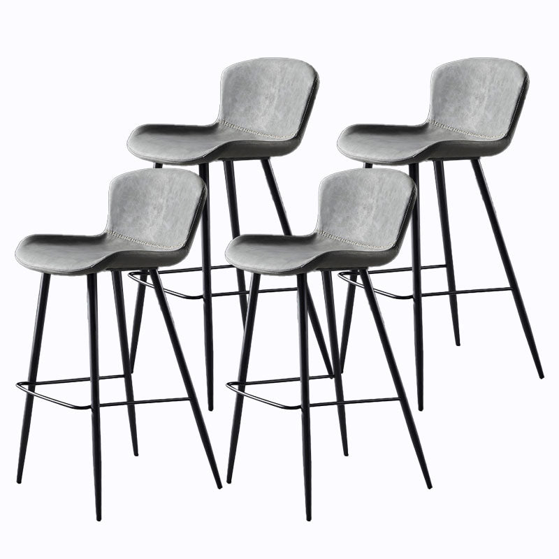 Sgabello imbottito in pelle senza schienale scandinavo