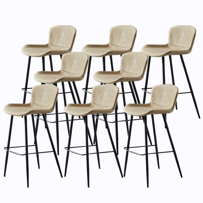 Sgabello imbottito in pelle senza schienale scandinavo