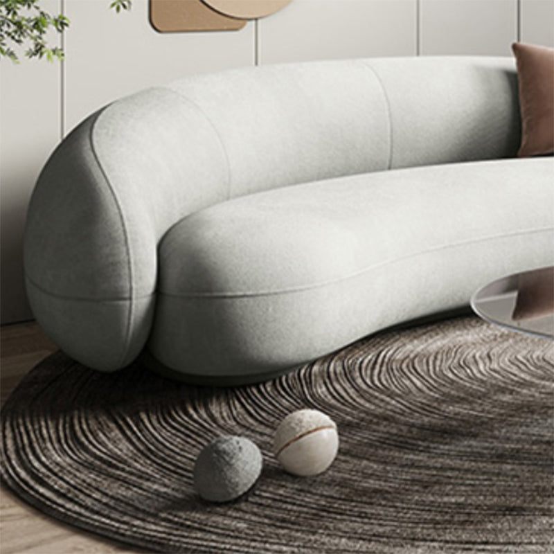 リビングルームの湾曲したソファのためのタキシードアームを備えたコンテンポラリーソファ