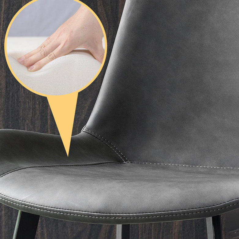 現代のアームレスダイニングチェアマット仕上げレザーカーブドパーソンズサイドチェア