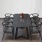 Mesa de comedor rectangular industrial de piedra sinterizada negra con base de metal