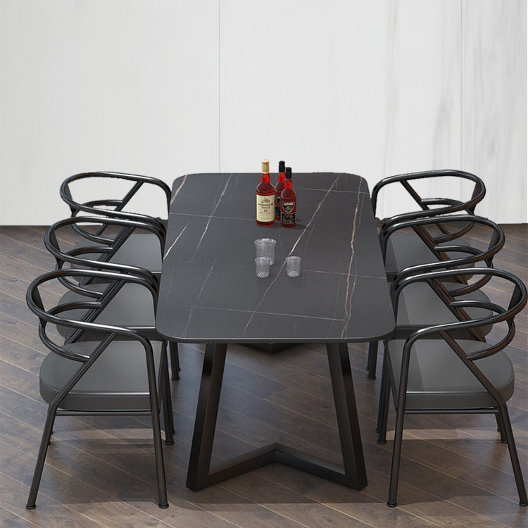 Mesa de comedor rectangular industrial de piedra sinterizada negra con base de metal