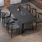 Mesa de comedor rectangular industrial de piedra sinterizada negra con base de metal
