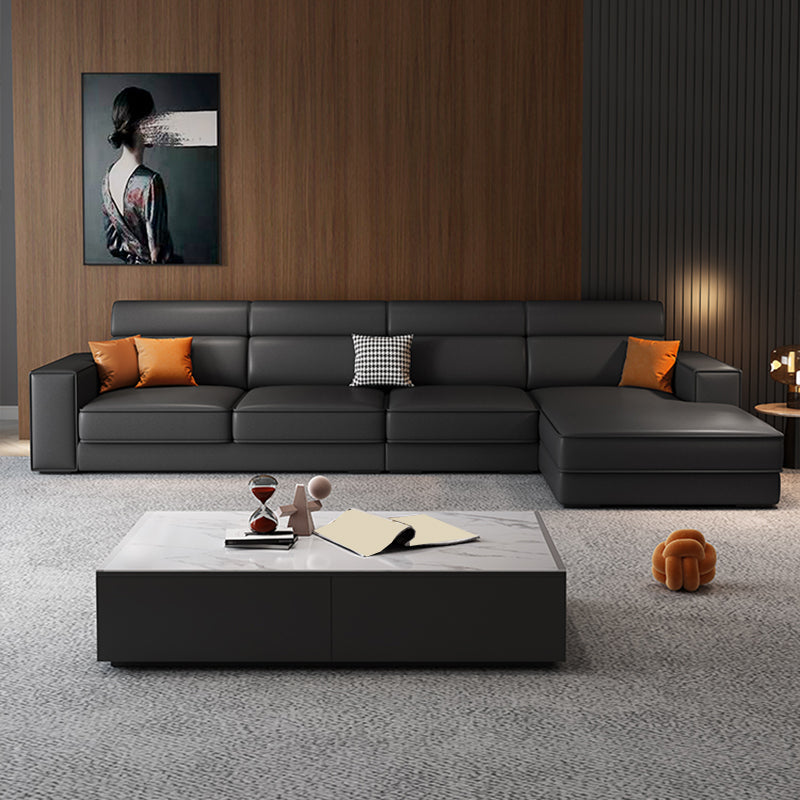 Divano in finta pelle scandinavo grigio scuro del braccio quadrato.