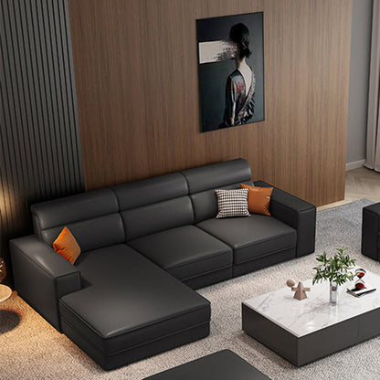 Divano in finta pelle scandinavo grigio scuro del braccio quadrato.