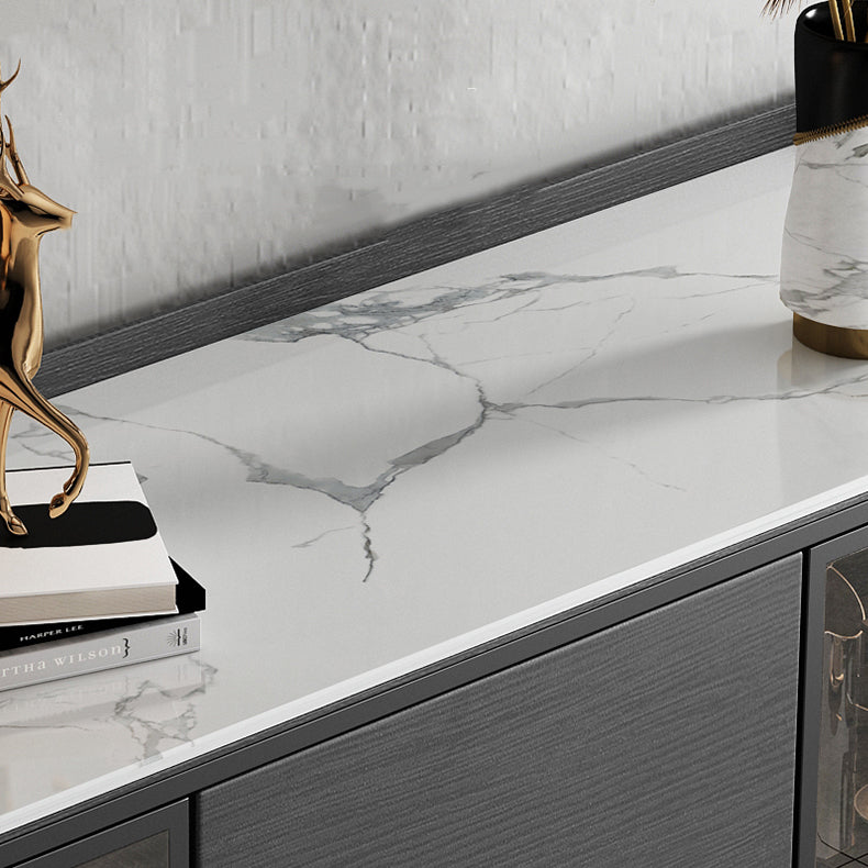 Soggiorno moderno server da pranzo in pietra e porte di vetro in legno