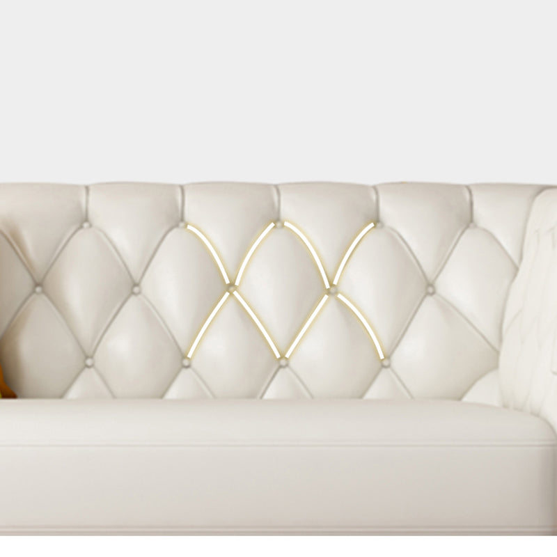 Divano posteriore trapuntato contemporaneo con braccio svasato in pelle finta per l'appartamento