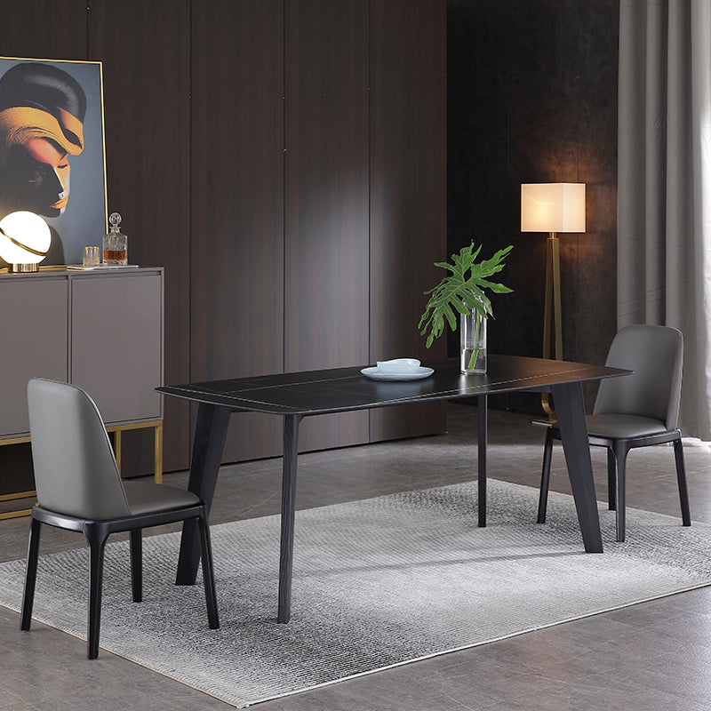 Table à manger noire rectangle industrielle en pierre fritrée avec 4 jambes