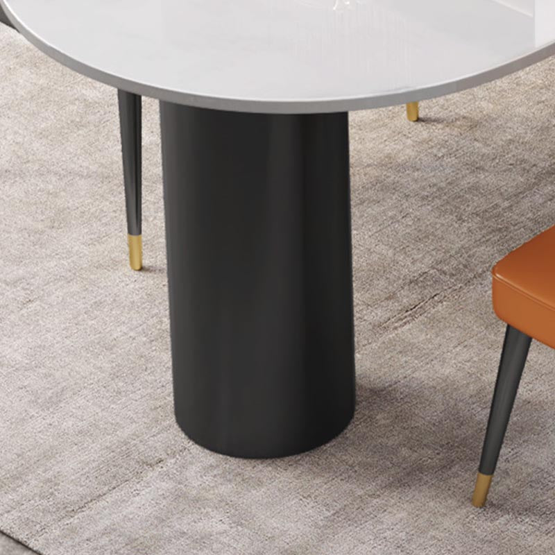 Table à manger en pierre moderne en pierre de fer ovale avec table de 3 jambes