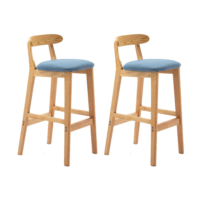 Cojín de tela de heces de madera escandinava en acabado mate para interiores