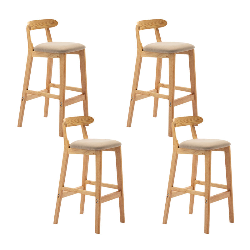 Cojín de tela de heces de madera escandinava en acabado mate para interiores