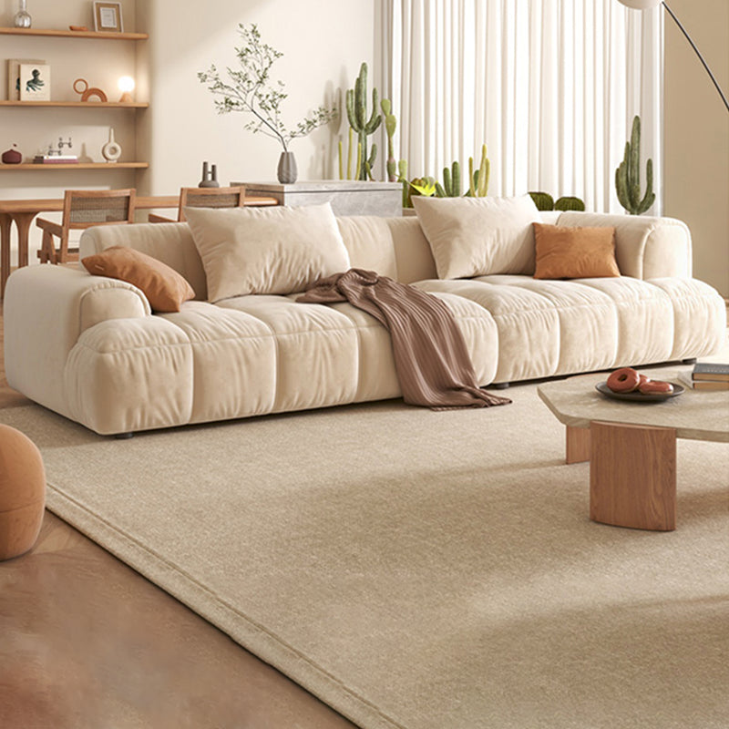 Sofá de estilo moderno coján de reposapiés embebido