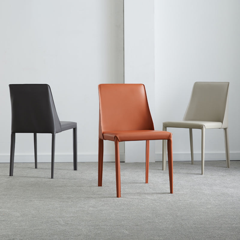Eigentijdse lederen armloze eetkamerstoel Metalen eetkamerstoelen voor thuisgebruik