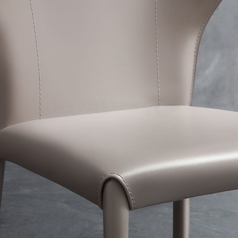 Eigentijdse lederen eetkamer stoel armloze wingback zijstoelen voor thuisgebruik
