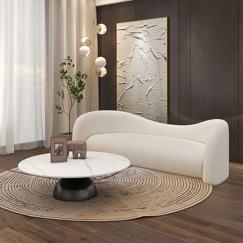 リビングルームのためにタイトな背中を持つ現代の湾曲したソファの傾斜腕ソファ