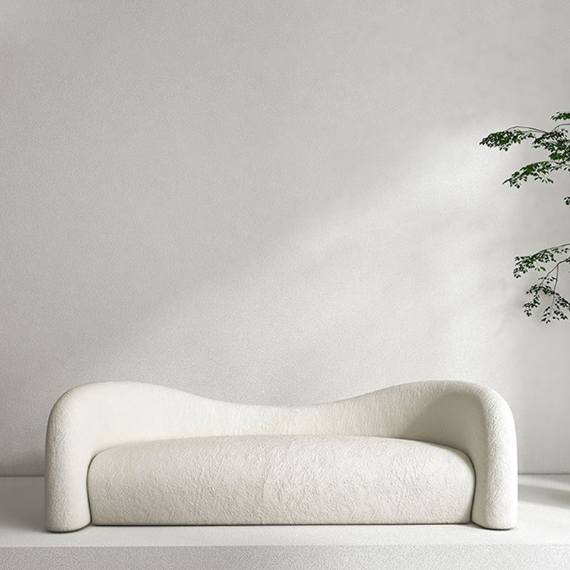 リビングルームのためにタイトな背中を持つ現代の湾曲したソファの傾斜腕ソファ