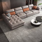 Tufted Pillow Top Arm Sofa with Chaise 133.86" W Faux Leather Sofa