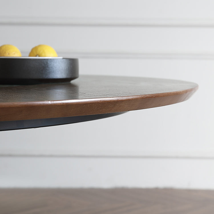 Eigentijdse ronde eettafel bruine as houten voetstuktafel