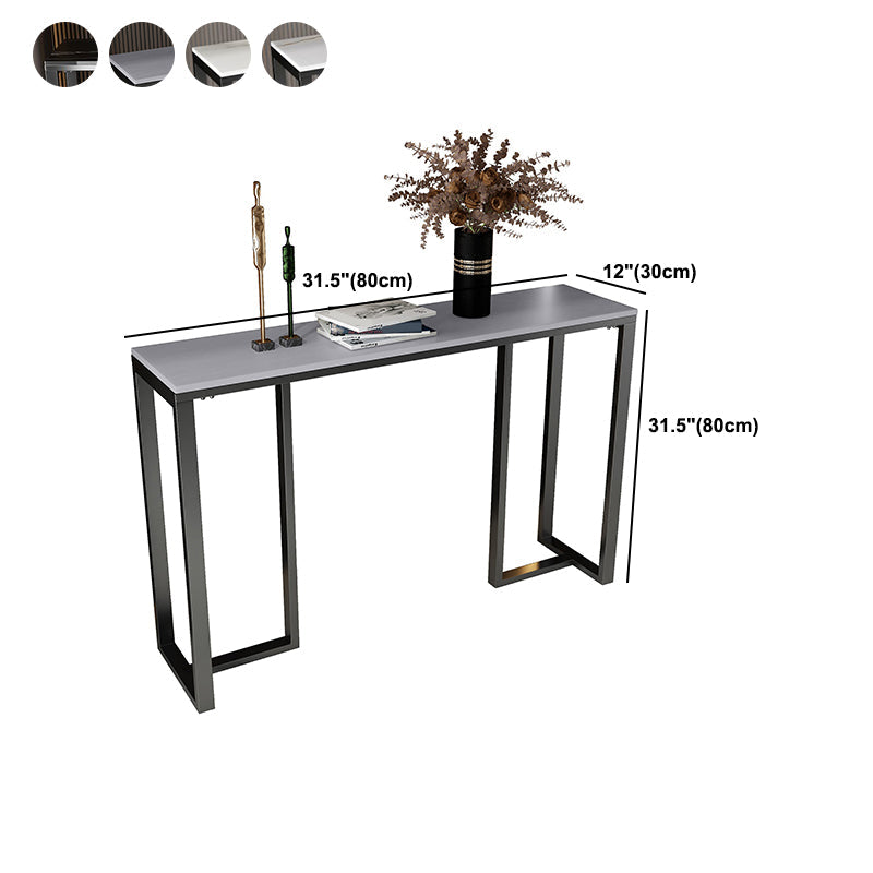 Tavolo accento superiore in pietra rettangolare con base ironica nera per Hall