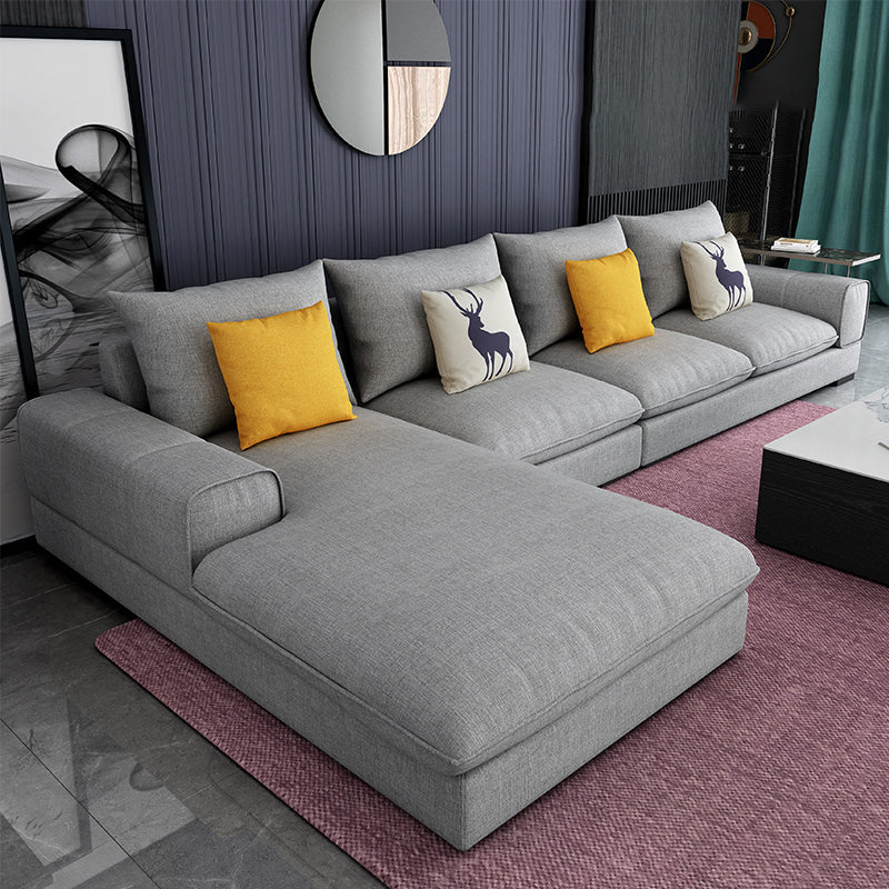 Section contemporaine en L avec oreiller en dos et bras encastrés pour 4 personnes