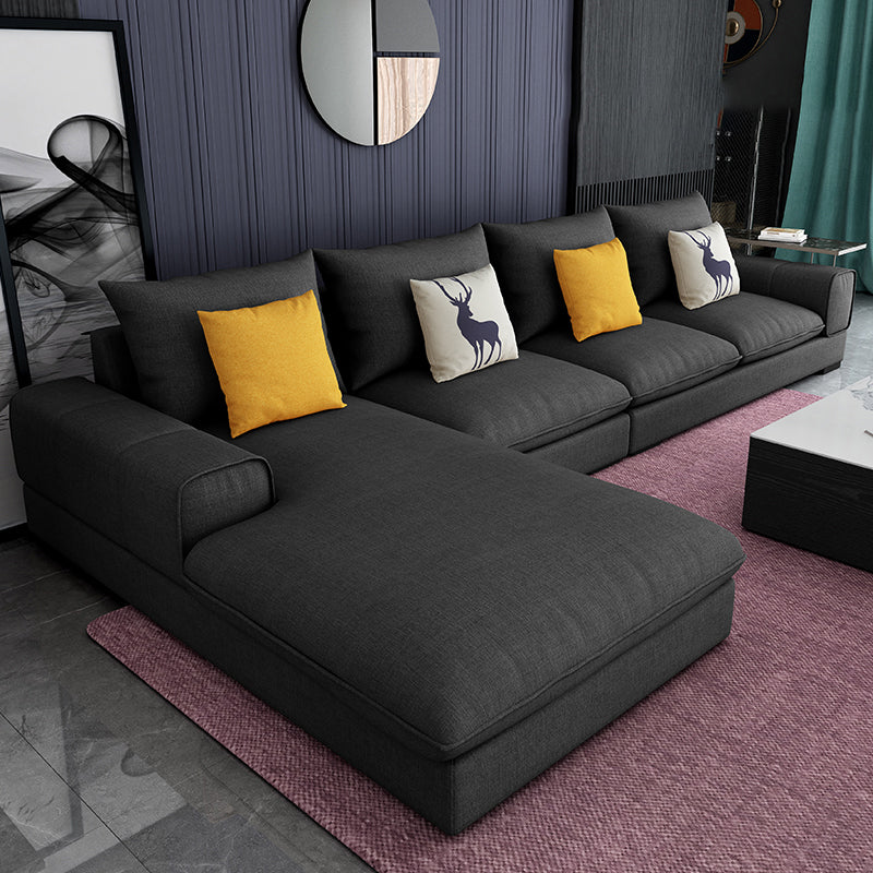 Section contemporaine en L avec oreiller en dos et bras encastrés pour 4 personnes
