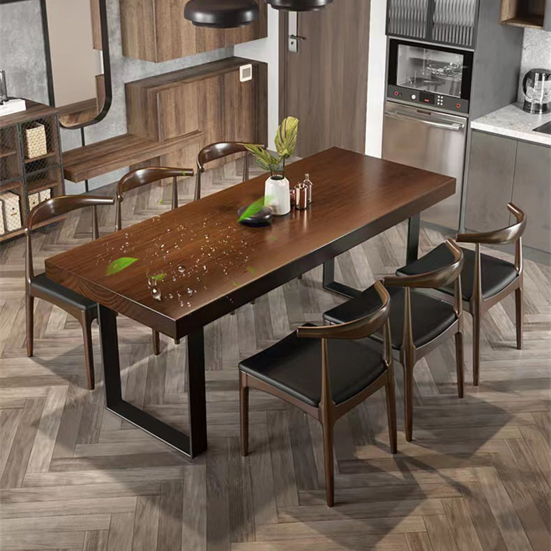 Brown Solid Wood Top Table Rectangle Black Iron Sled Base Dining Table Clearhalo 'Dining Tables & Seating' 'Dining Tables' 'dining_table' 'furn' 'furn_dining_table' 'Furniture' 'Kitchen & Dining Furniture' 5752042