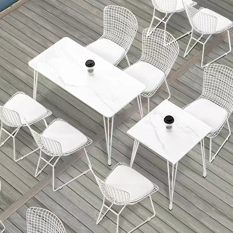 Mesa de comedor al aire libre con trípode Mesa de cena moderna con base metálica y tapa de piedra