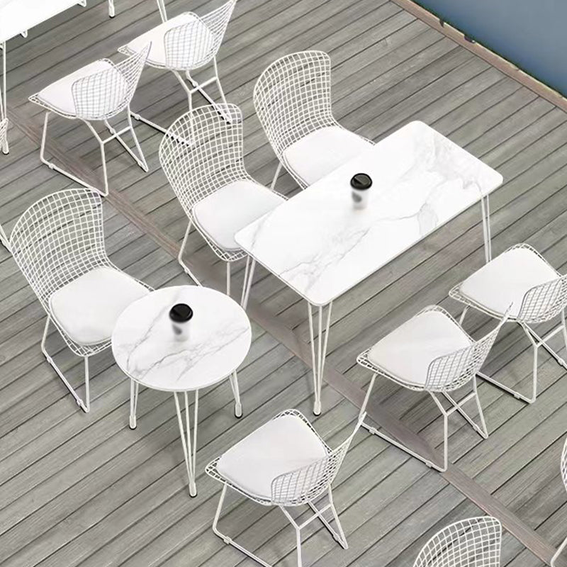 Mesa de comedor al aire libre con trípode Mesa de cena moderna con base metálica y tapa de piedra