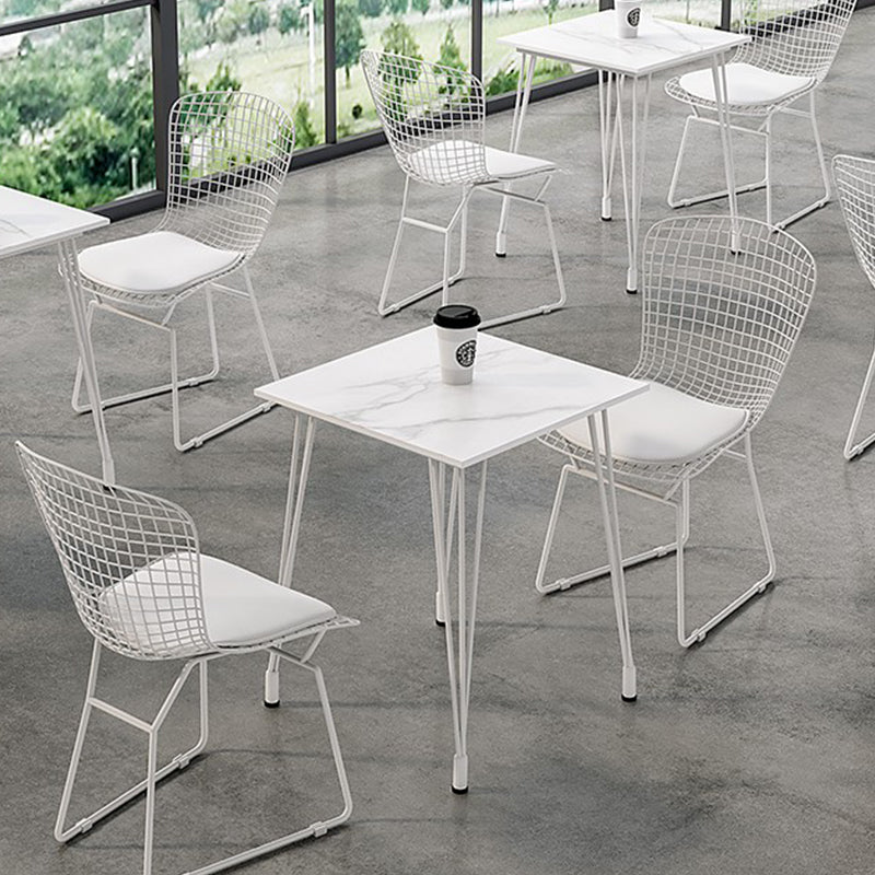 Mesa de comedor al aire libre con trípode Mesa de cena moderna con base metálica y tapa de piedra