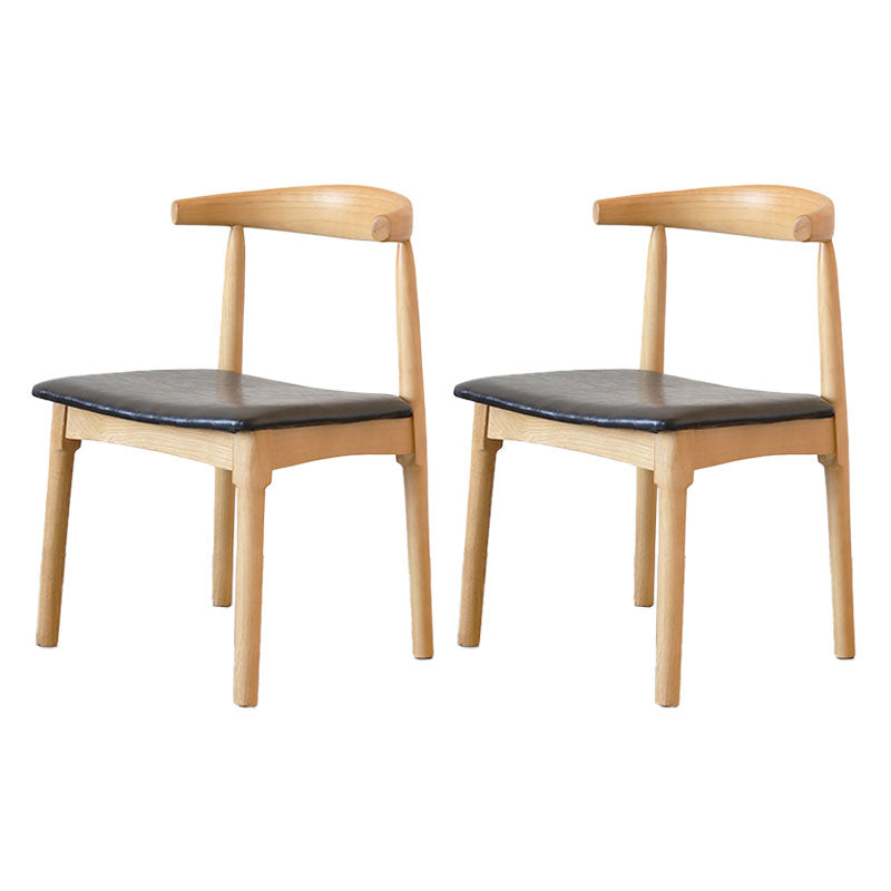 Sillas de comedor de cuero PU Diseño industrial Silla de comedor de espalda abierta