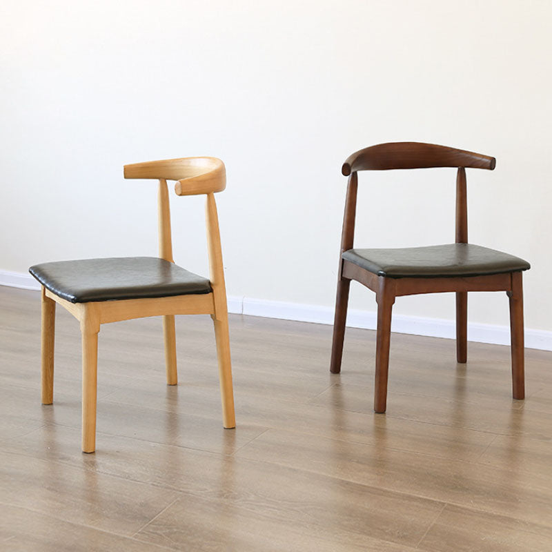 Sillas de comedor de cuero PU Diseño industrial Silla de comedor de espalda abierta