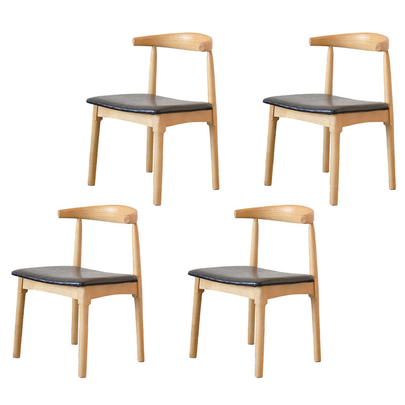 Sillas de comedor de cuero PU Diseño industrial Silla de comedor de espalda abierta