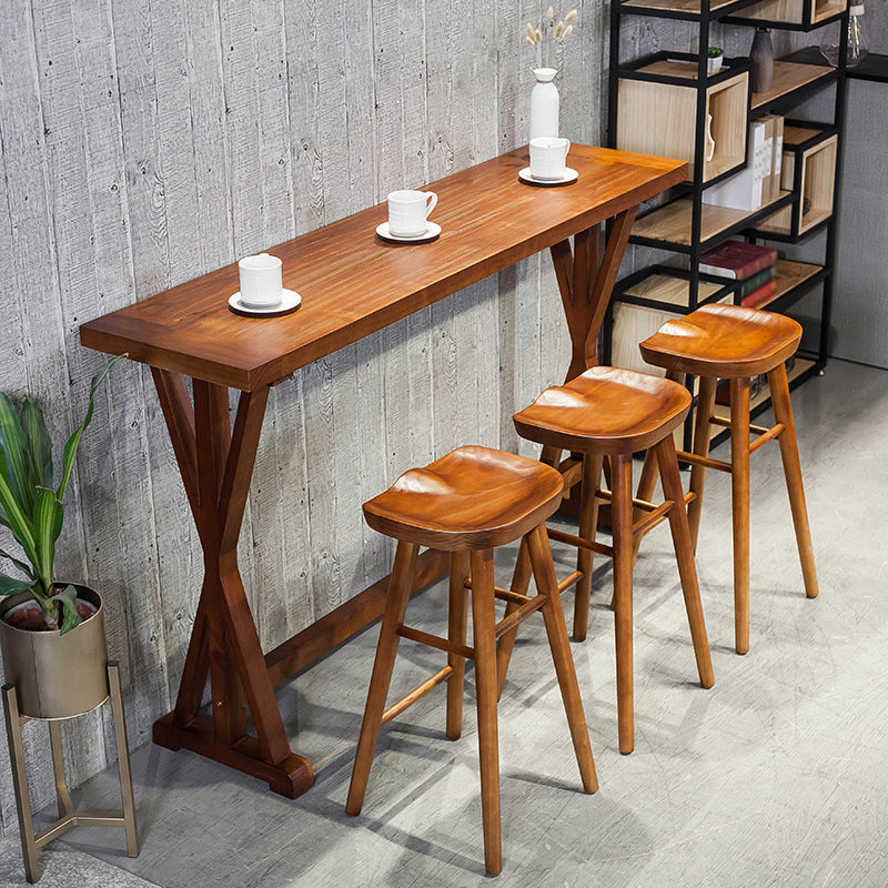 Brown Solid Wood Top Bar Table for Small Places Contemporary Pub Table with Trestle 55.1"L x 17.7"W x 41.3"H Without Chairs Clearhalo 'Bar Furniture' 'Bar Tables' 'bar_tables' 'furn' 'furn_bar_tables' 'Furniture' 'Kitchen & Dining Furniture' 5758810