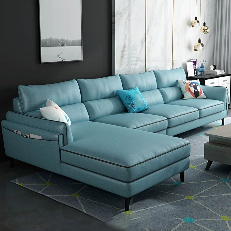 Sectionnel en faux cuir en L avec bras encastrés et rangement