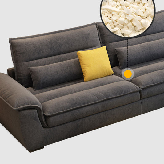 Vlekbestendige stationaire woonkamer wijd uitlopende arm grijze kussens bank