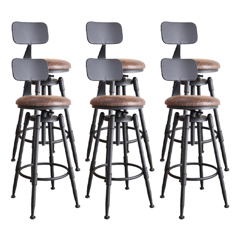 Taburete industrial de metal tapizado de piel sintética con acabado mate para interior